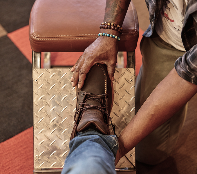 Red Wing boot being fitted.