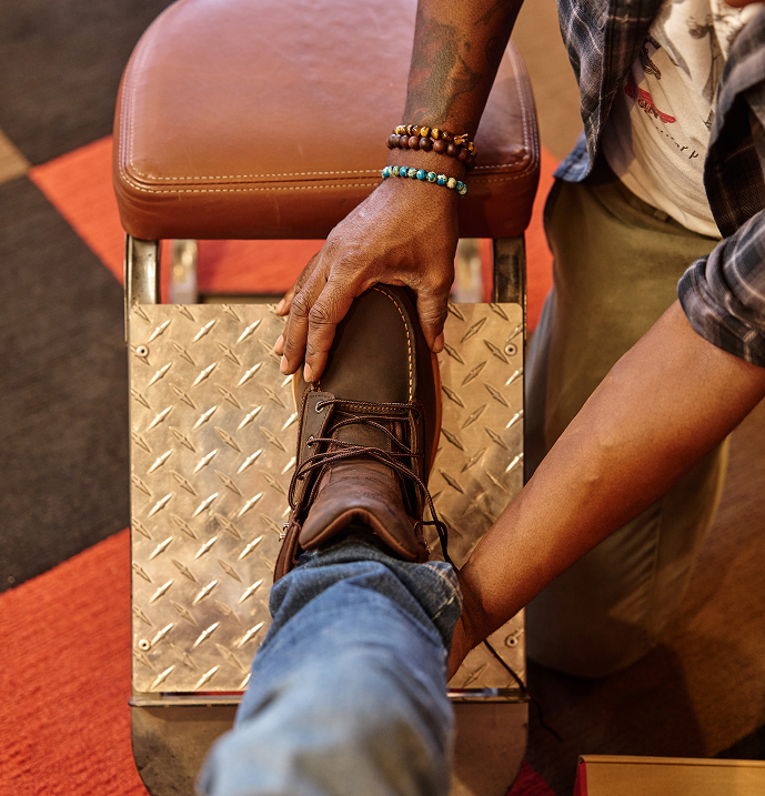 Red Wing boot being fitted.